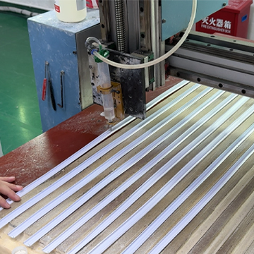 Precision-cutting the raw materials into the shape of paddles using CNC machines for consistent quality