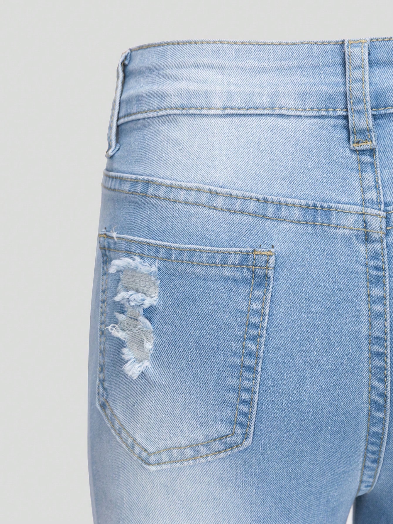 TeenGirlRippedRawHemJeans_18562439_details_3