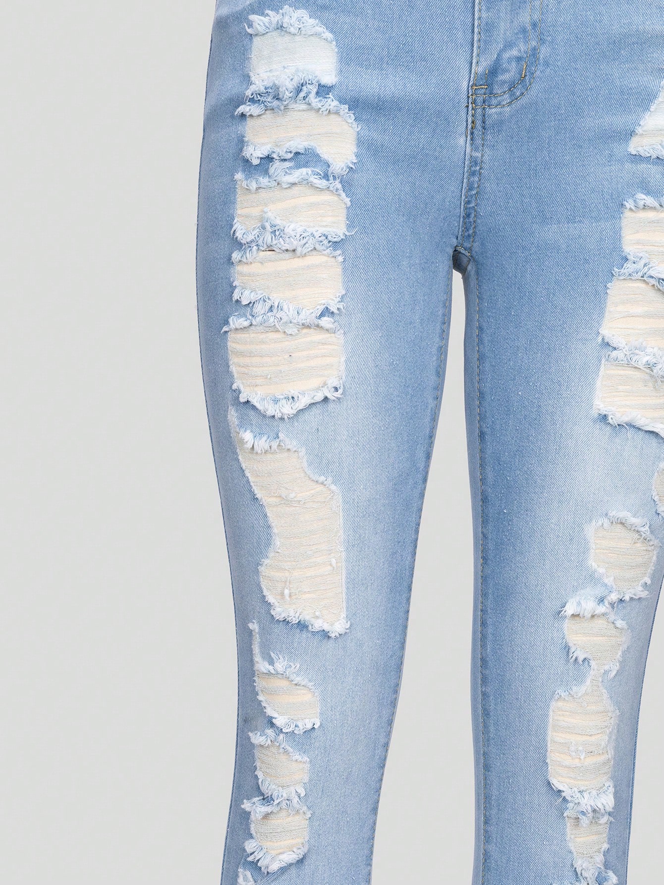 TeenGirlRippedRawHemJeans_18562439_details_4